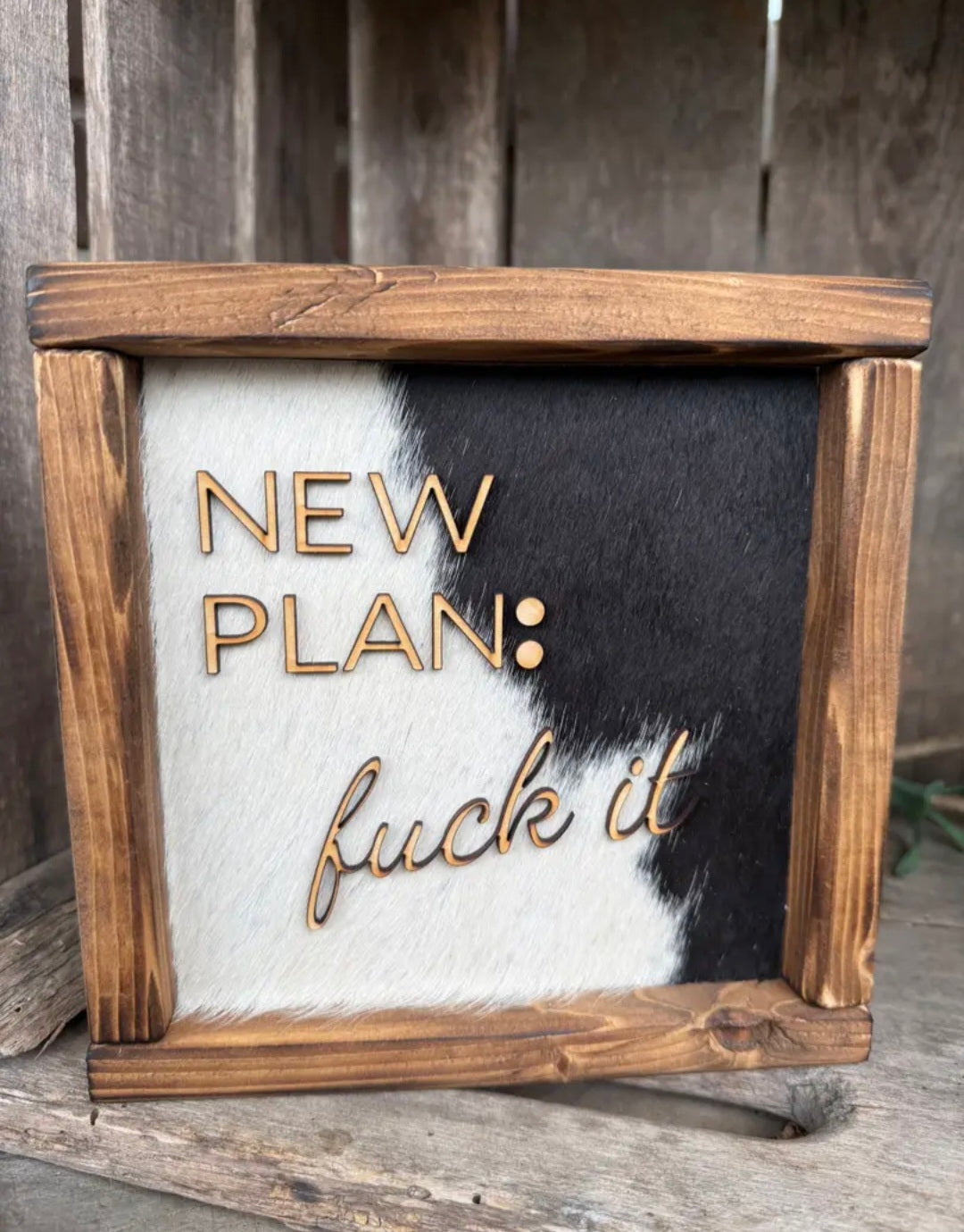 New Plan - Cowhide Sign